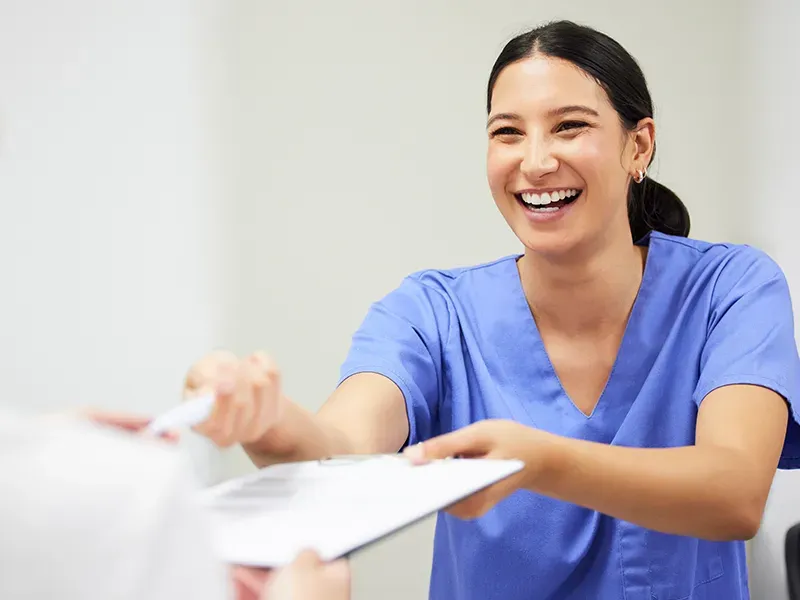 Completing new patient paperwork