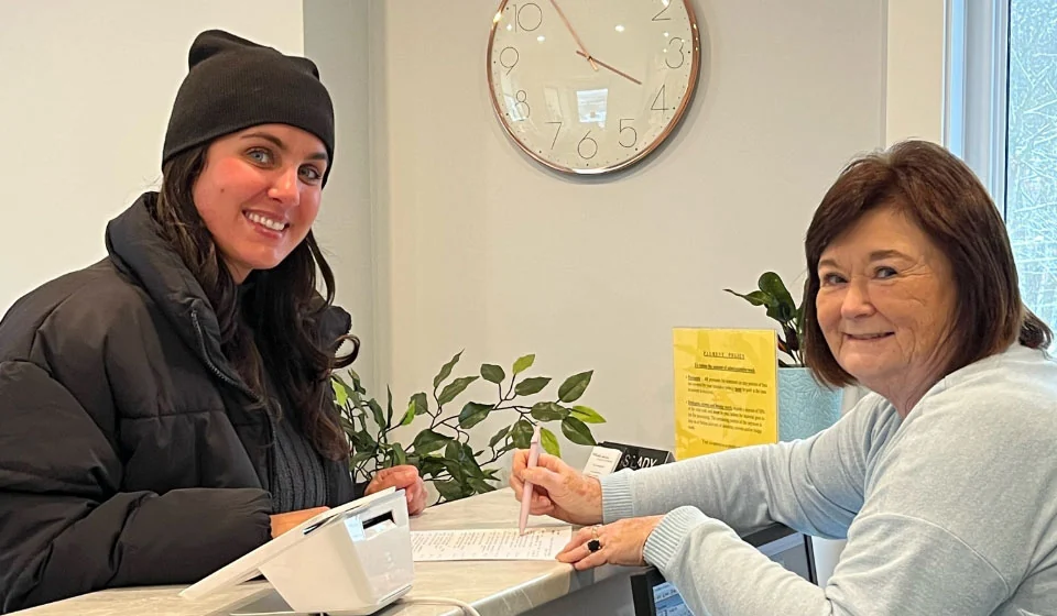 patient scheduling her next dental appointment at Sackville Smile Centre